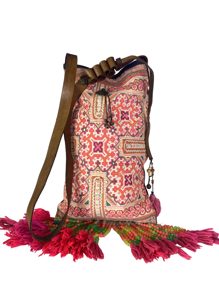 Bohemian Rhapsody -  Shoulder Boho Bag Hmong Fabric in Pink and Burnt Orange with Pompom Detail